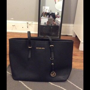 Black and gold Michael Kors tote