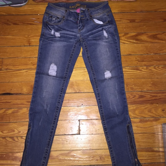 Distressed denim jeans
