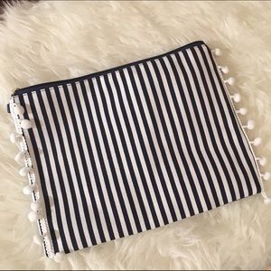 Pom Pom striped clutch NWOT Pom Pom striped clutch NWOT