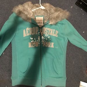 Faux fur lined zip up sweatshirt