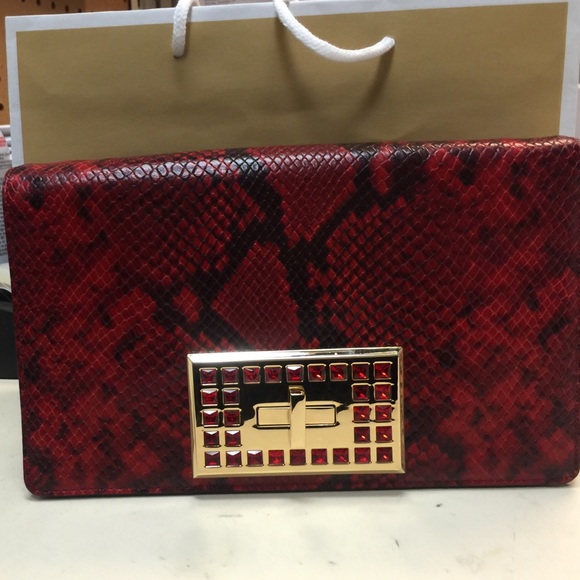 Red Michael Kors handbag
