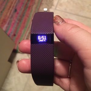 Purple Fitbit, like new,only used for three months