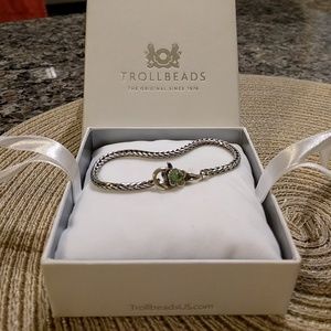 Sterling silver charm bracelet with double clasp.