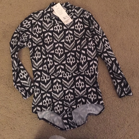 Never worn long sleeve swimsuit
