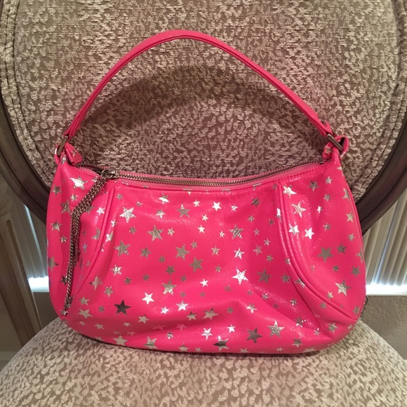 Hot pink Nicky Hilton purse with silver stars
