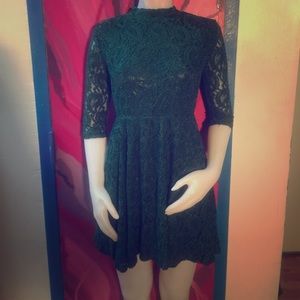 Green lace dress with open back