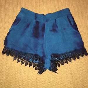 High waisted turquoise fabric shorts
