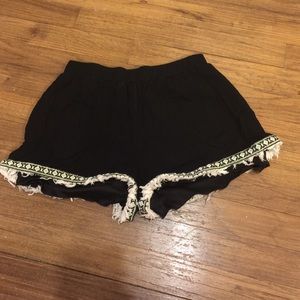 Black, neon green, white shorts