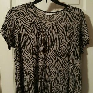 A gray and black short sleeved shirt