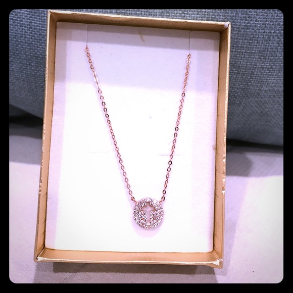 Rose gold Cross necklace.