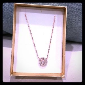 Rose gold Cross necklace.