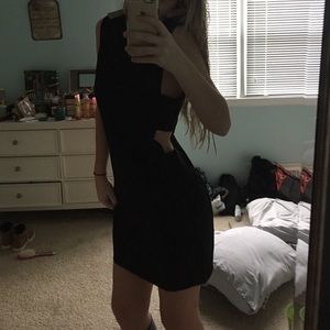 Black mini dress with side piece cut out!