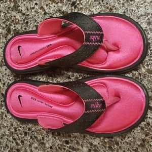 Nike flip flops.
