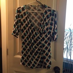 Blue and black geometric blouse with side ruching!