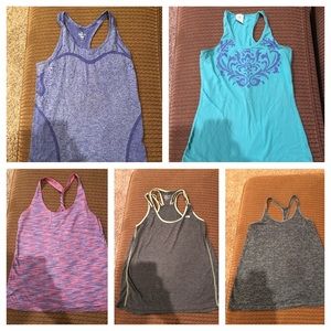 Five Workout tanks
