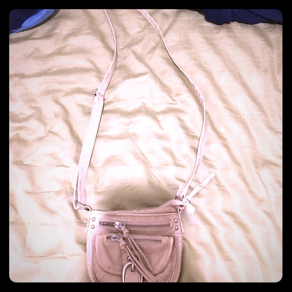 Small, beige bag.