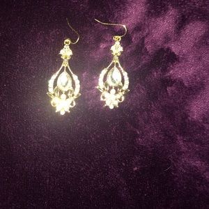 Brand new pair of gold diamond-encrusted earrings!
