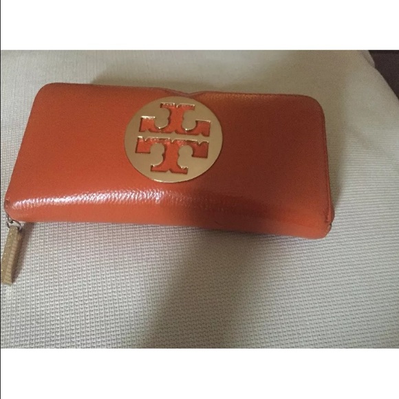 Tory wallet color orange few pen spots