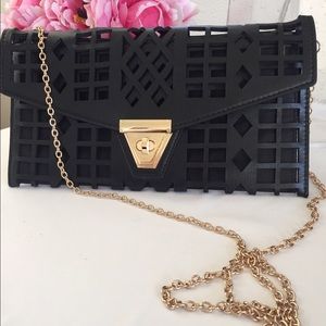 MMS Design Studio Clutch