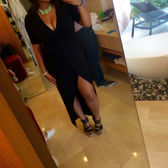 Low Cut, High Slit black dress