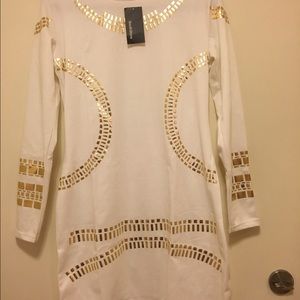 White dress with gold accents