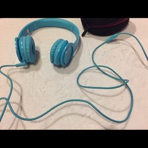 Light blue solo HD Beats by Dr. Dre headphones