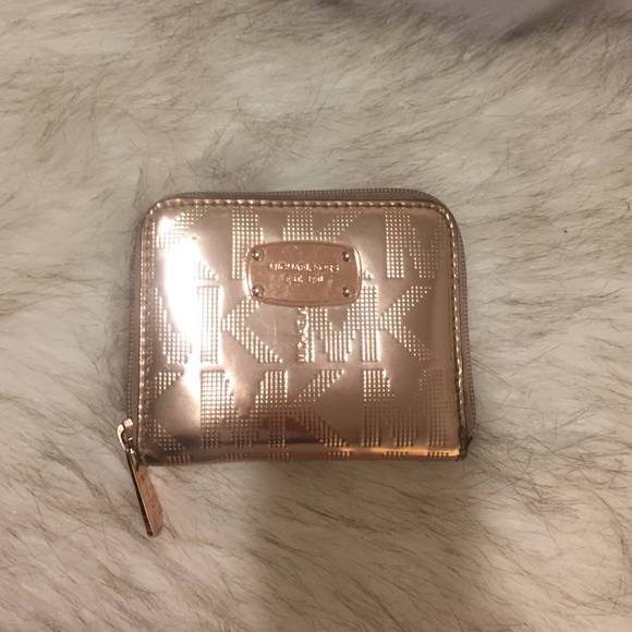 Lightly used Rose gold Michael Kors wallet