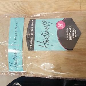 New in package 14 in. Natural blonde extensions