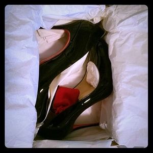 Christian Louboutin black pumps