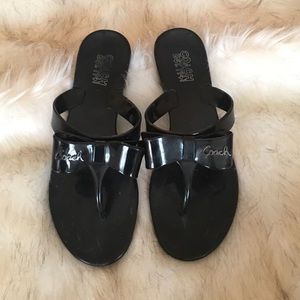Black coach flip flops