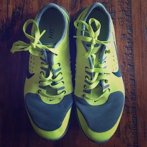 Lime green and gray Nikes.