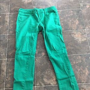 Green skinny jeans