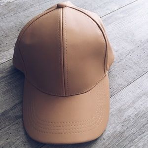 Tan, faux leathered baseball hat
