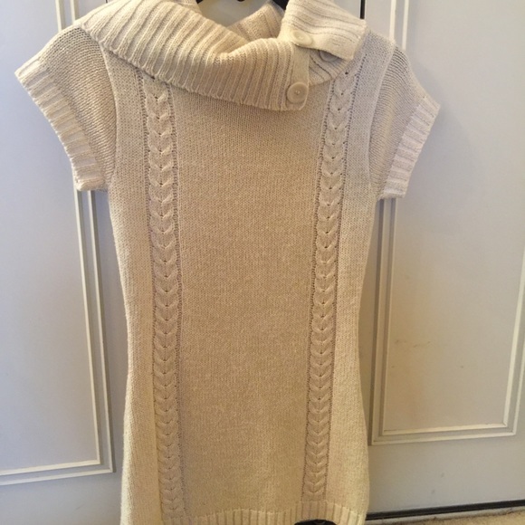 Gold shiny on white sweater top