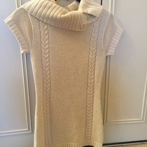 Gold shiny on white sweater top