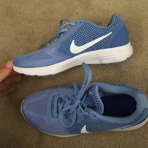 light blue NIKES, never worn! 8.5 size