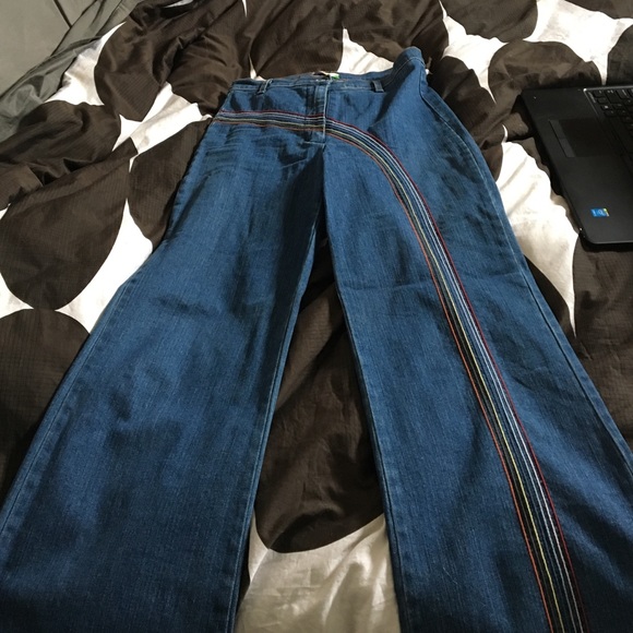 Wide leg 1970s style rainbow jeans.