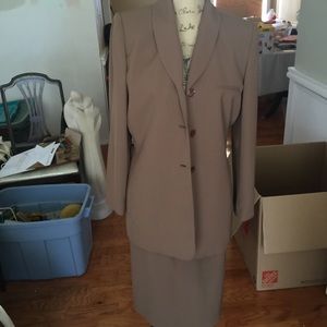 Three piece suit. Worn once-professional