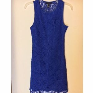 A blue fitted lace dress