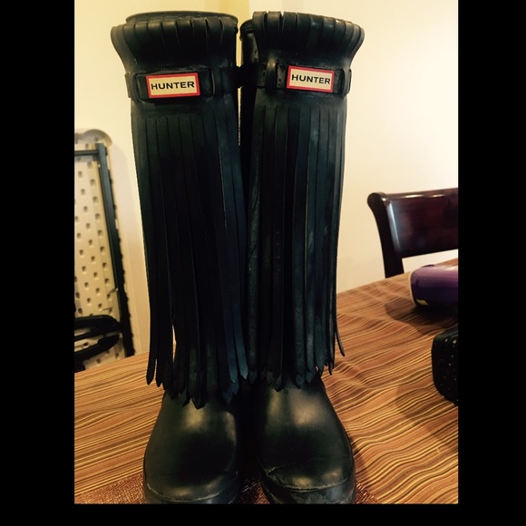 Hunter fringe boots never worn