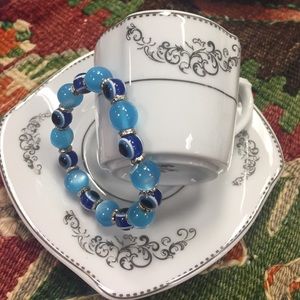Coffee cup with bracelet