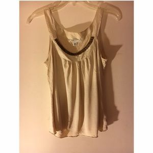 A tank top blouse cream color