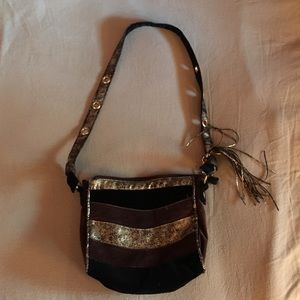 Stylish black, gold and brown purse
