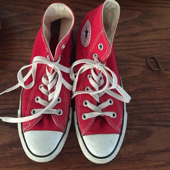 Red converse high top shoes