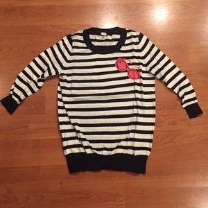 Quarter-length sleeve, striped sweater.