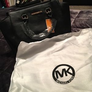 Michael Kors black purse and dust bag