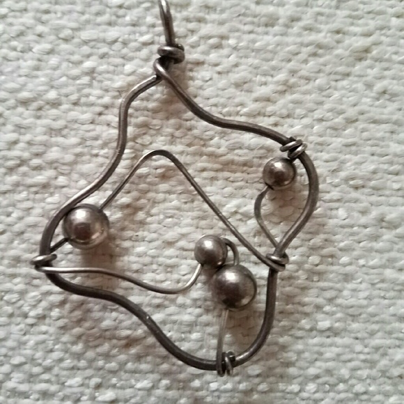 Sterling silver pendant with unique design