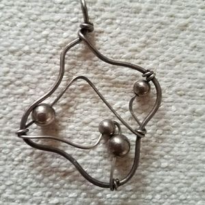 Sterling silver pendant with unique design