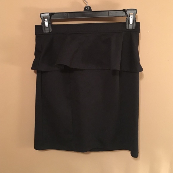 Black mini shirt with ruffle detail