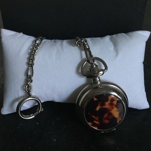 Tortoise shell fossil pocket watch